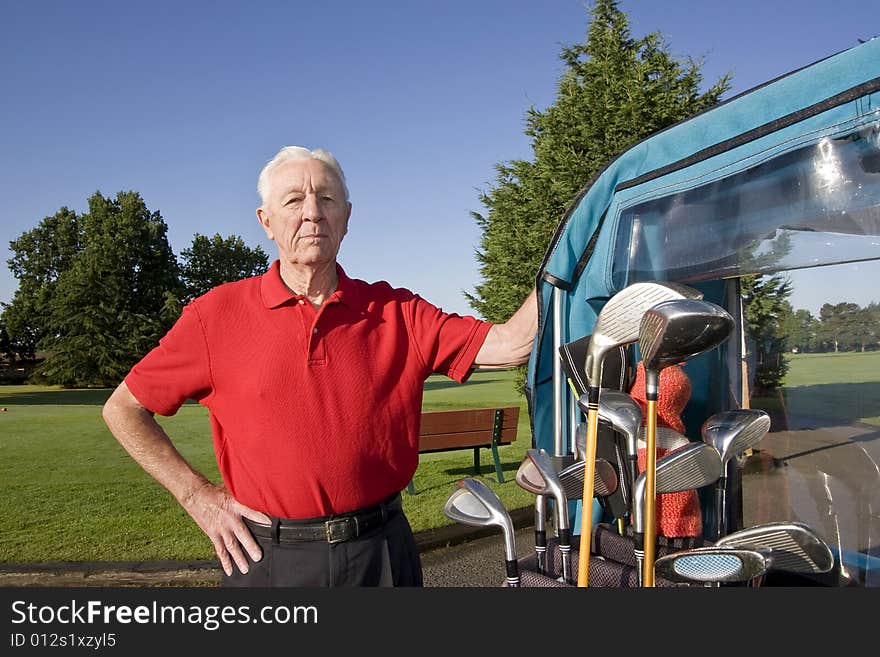 Man Next To Golf Cart Smiling