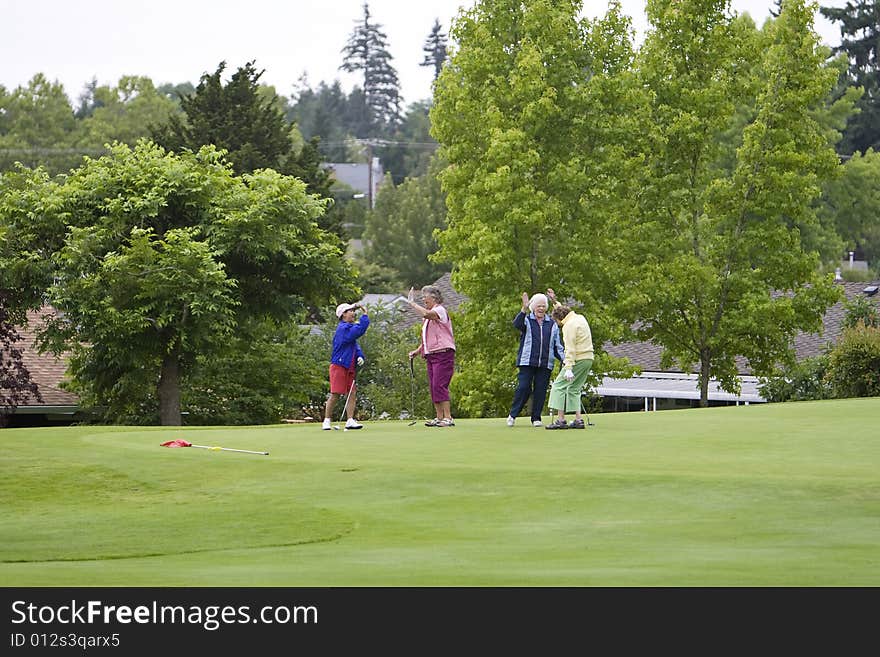 Women Playing Golf