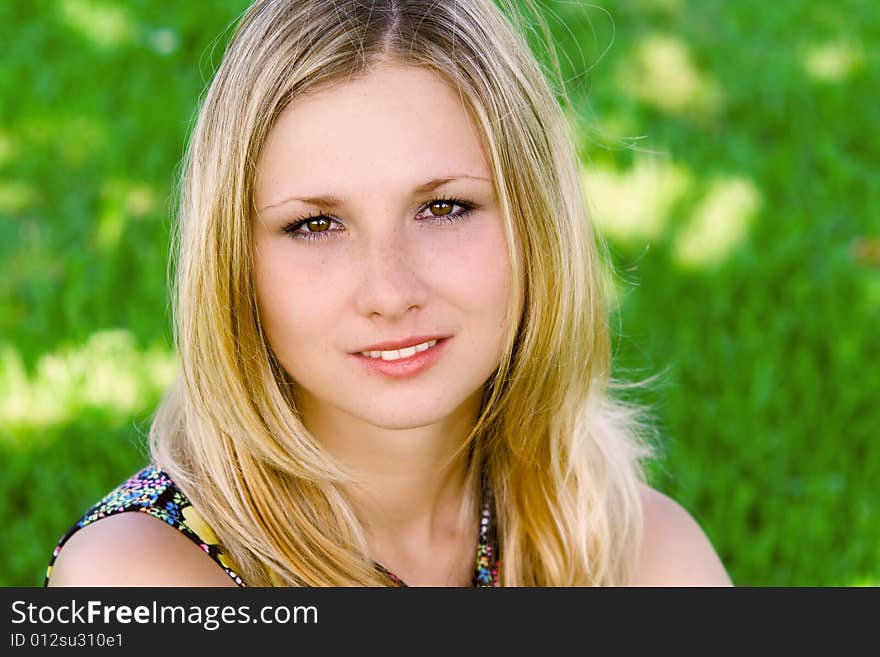 Blond girl smiling