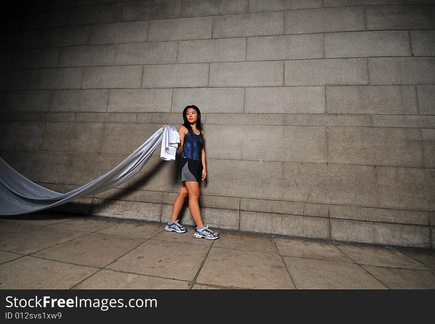 Pictures of people swirling fabric in motion. Useful for context on creativity or artistic expression or freeze motion. Pictures of people swirling fabric in motion. Useful for context on creativity or artistic expression or freeze motion.