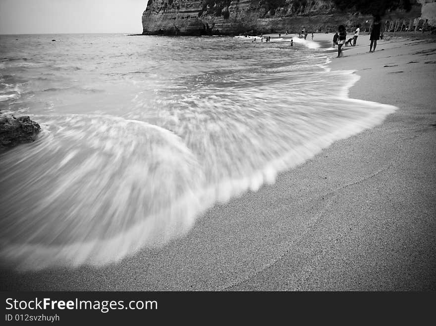 Long exposed wave in beautiful beach, monochrome toned.