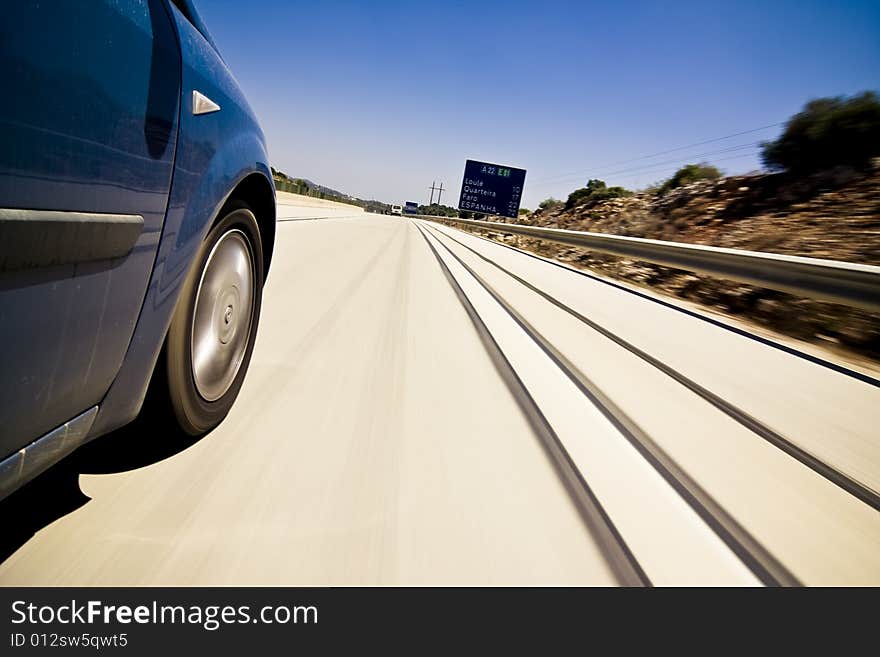 Blue car at high speed on the road. Blue car at high speed on the road