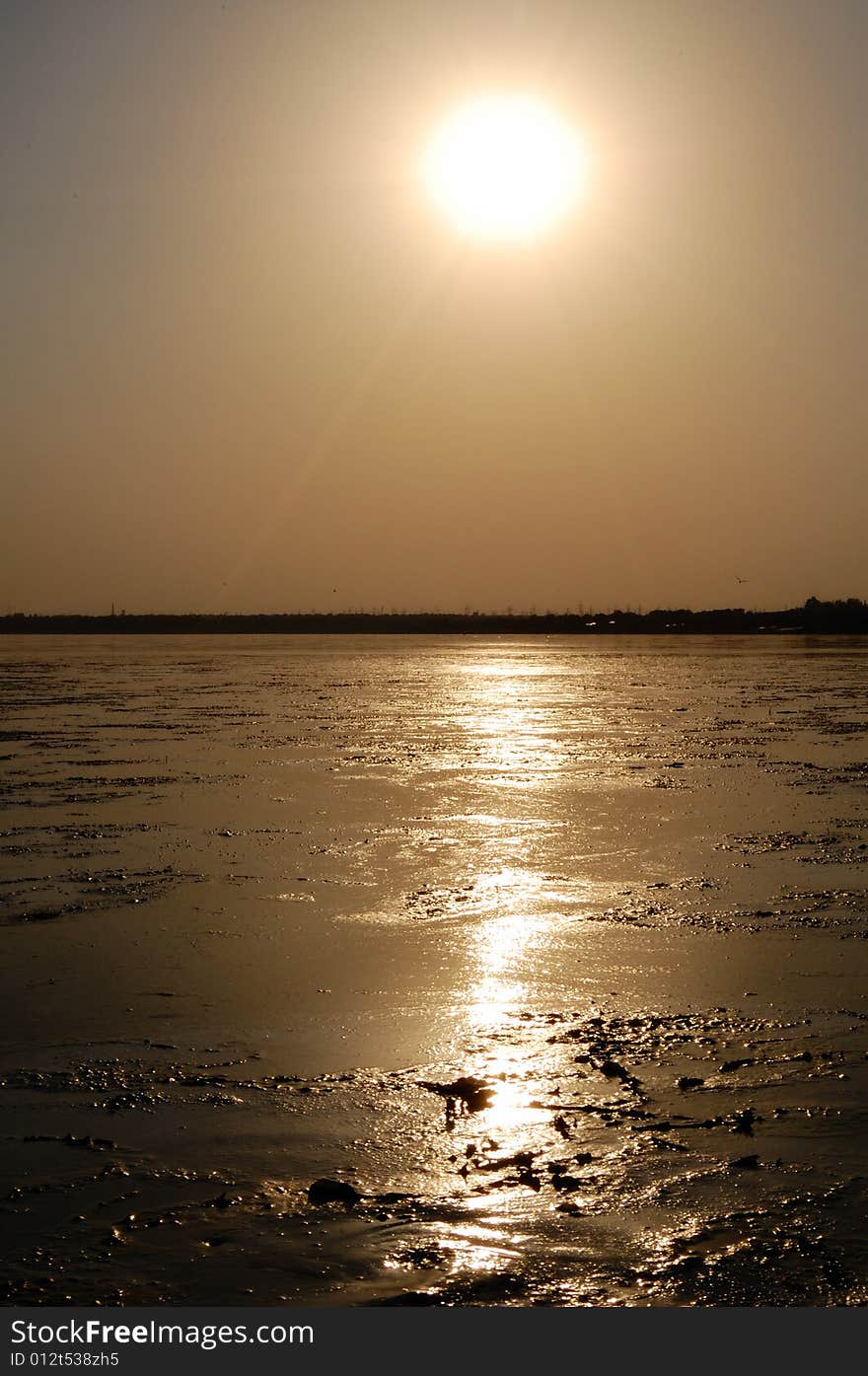 Sunset of a sun at the seaside. Gorgeous color clear subject good focus and exposure.