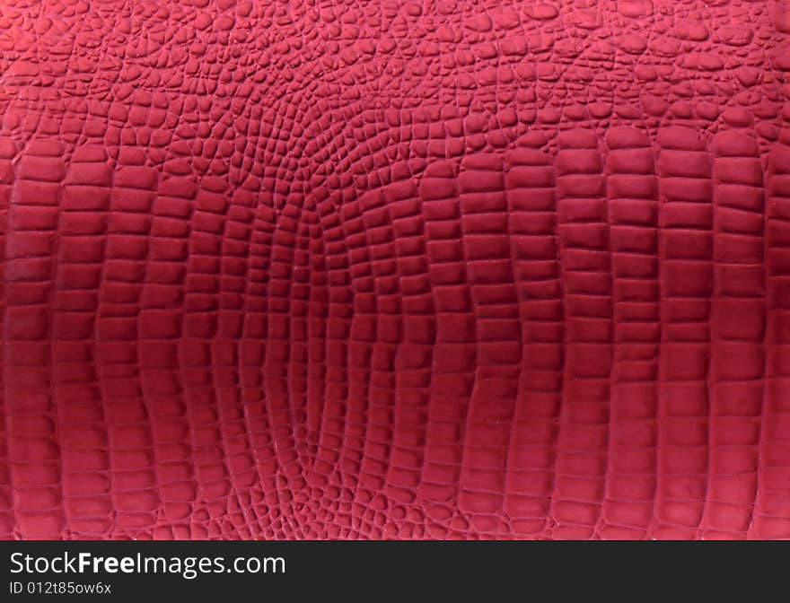 Red reptile leather imitation texture. Red reptile leather imitation texture