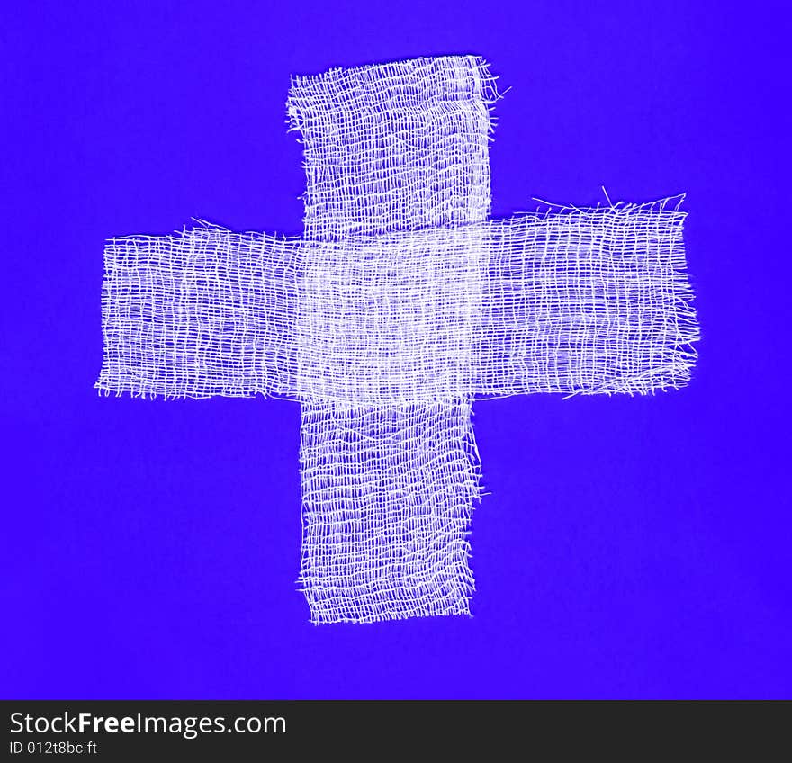 Two white bandages forming a cross