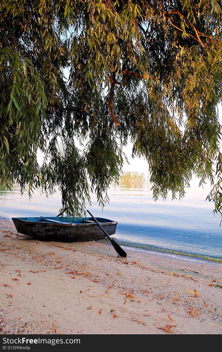 Boat at shore. Gorgeous color attractive subject good focus and exposure.