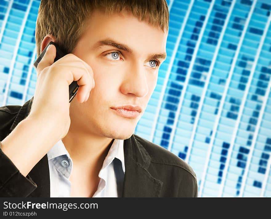 Young handsome man talking on the phone