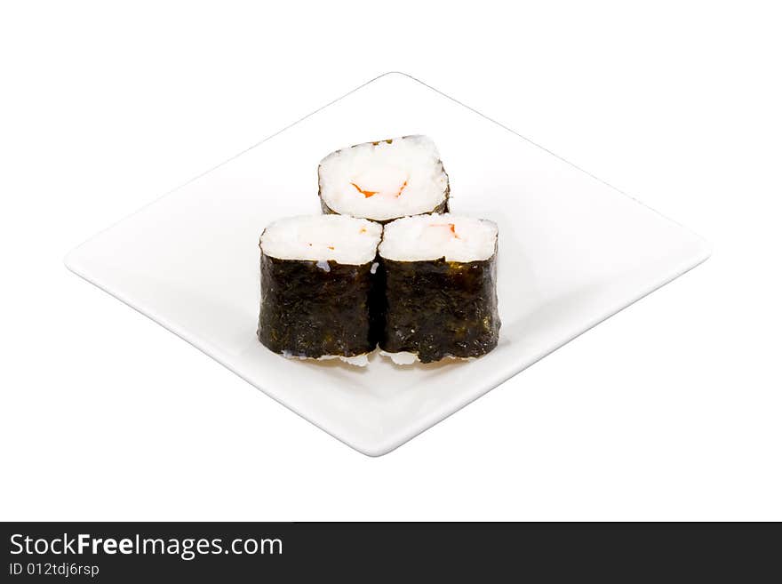 A square white plate with three pieces of sushi