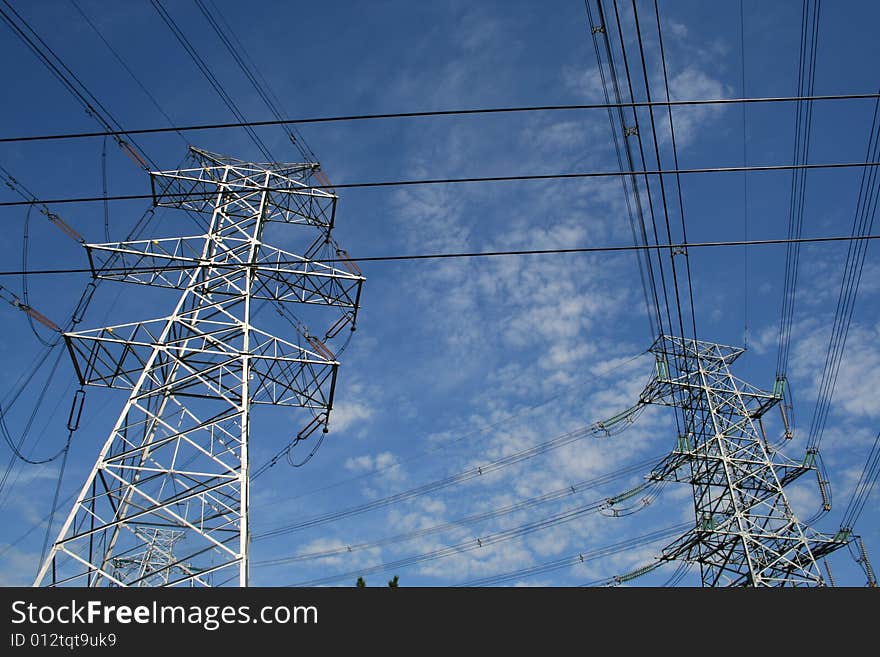 Electricity power pylon stretches into the sky