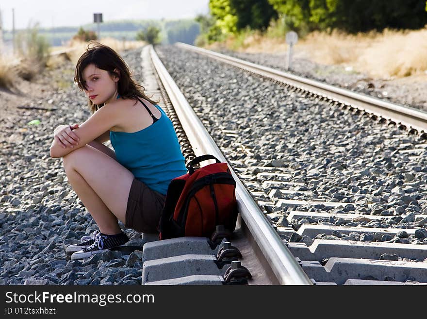 Backpacker Taking A Brake In The Shadow