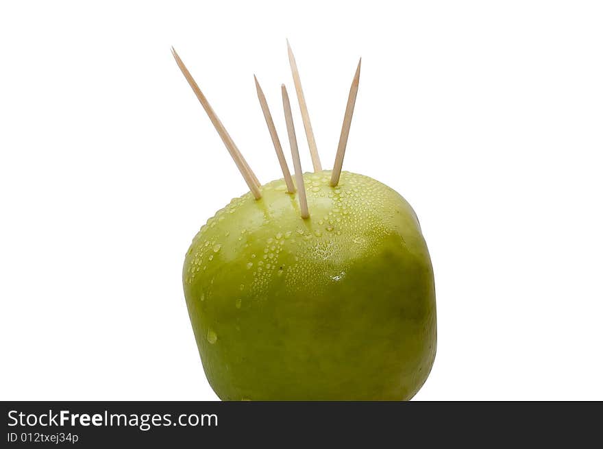 Prickly green apple with spikes going from within