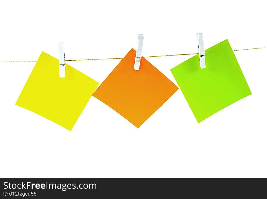 Colored notepaper on white background