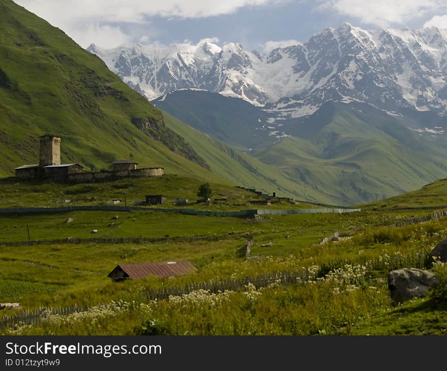 Ushguli beauty small village in georgia. Big mountains green grass. Beauty place.