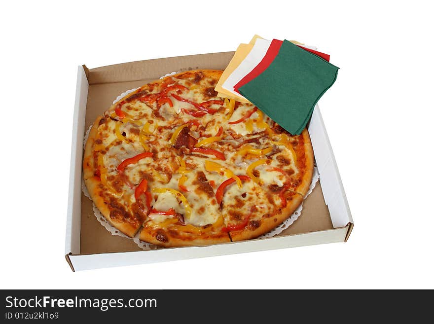 Fresh pizza lying in pasteboard box with colored tissue paper. Fresh pizza lying in pasteboard box with colored tissue paper