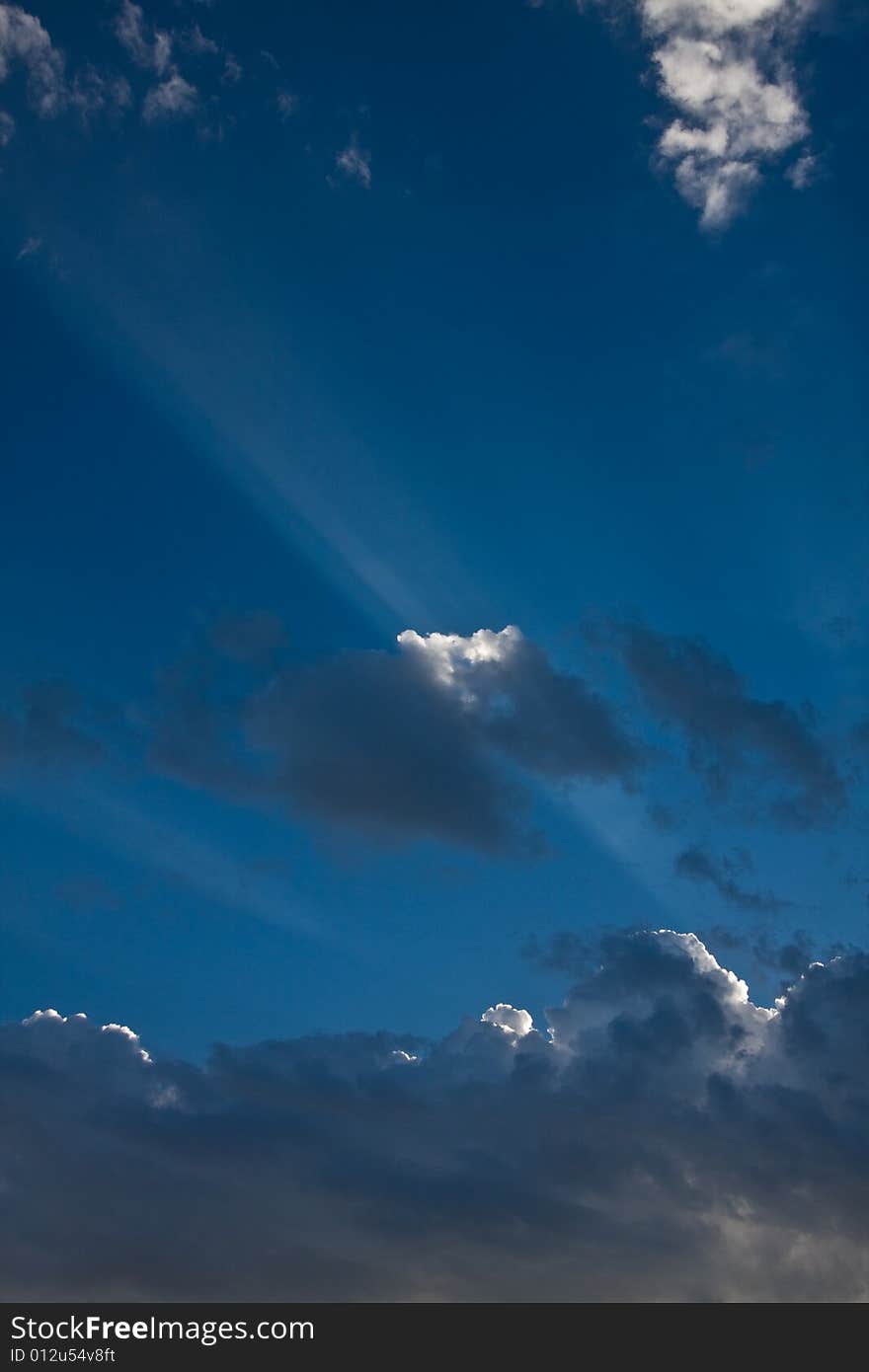 Shafts of light caused by sun and clouds