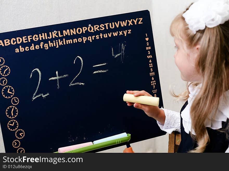 An image of little girl in classroom