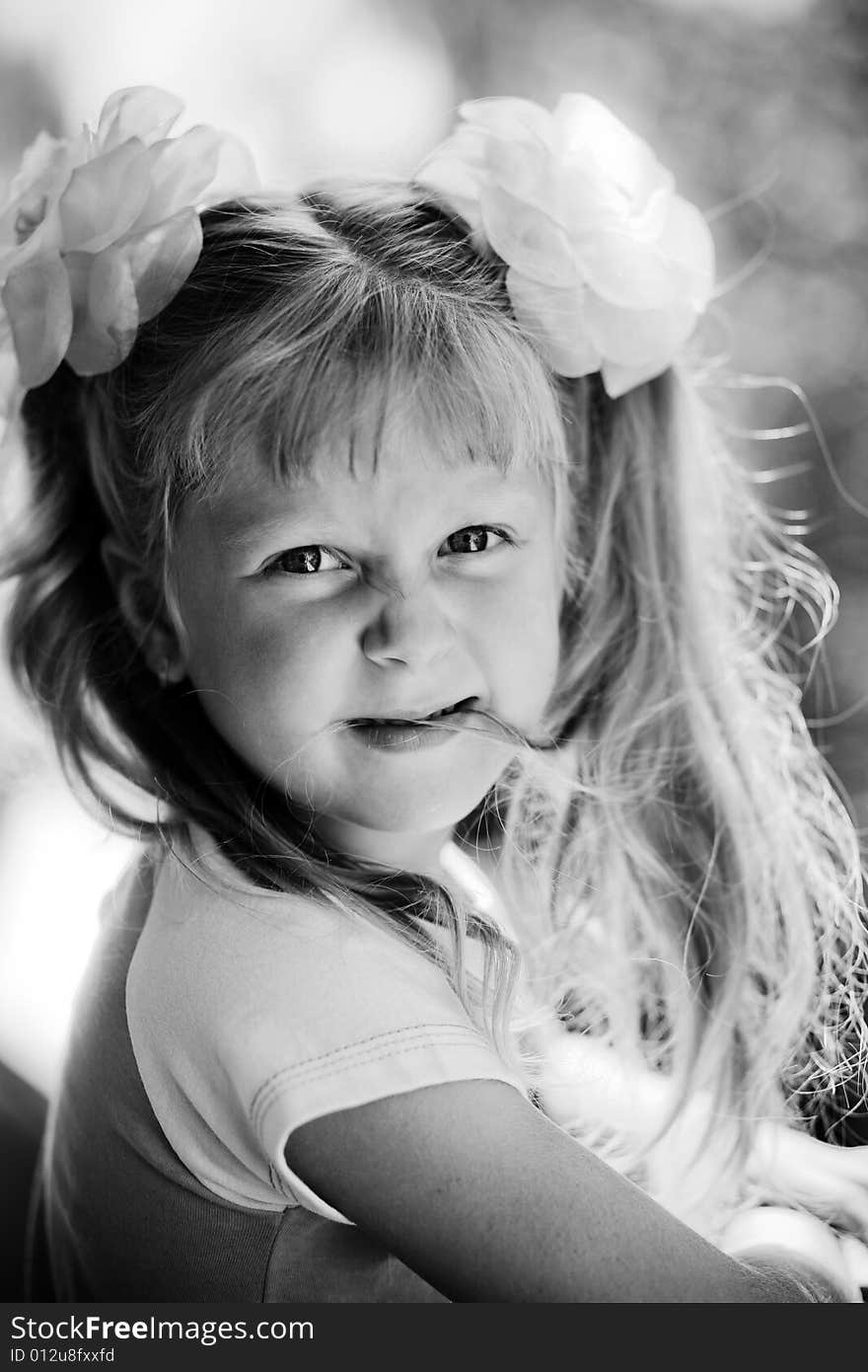 Black and white portrait of cute girl. Outdoor. Black and white portrait of cute girl. Outdoor.