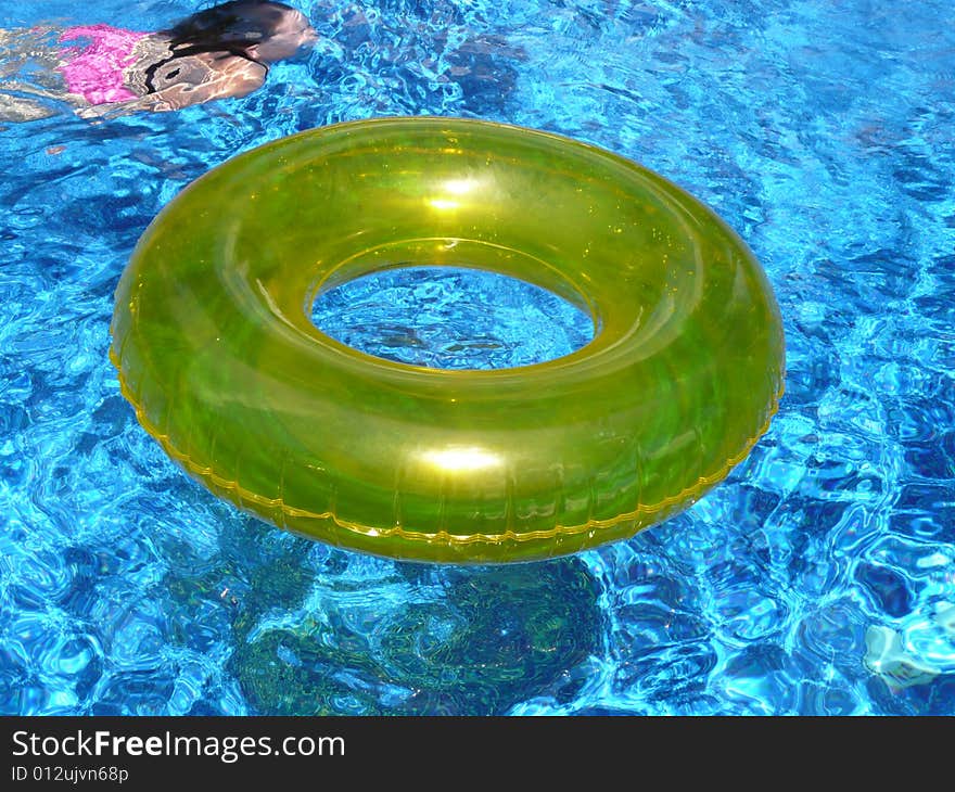 Taking a swim in a cool pool. Taking a swim in a cool pool