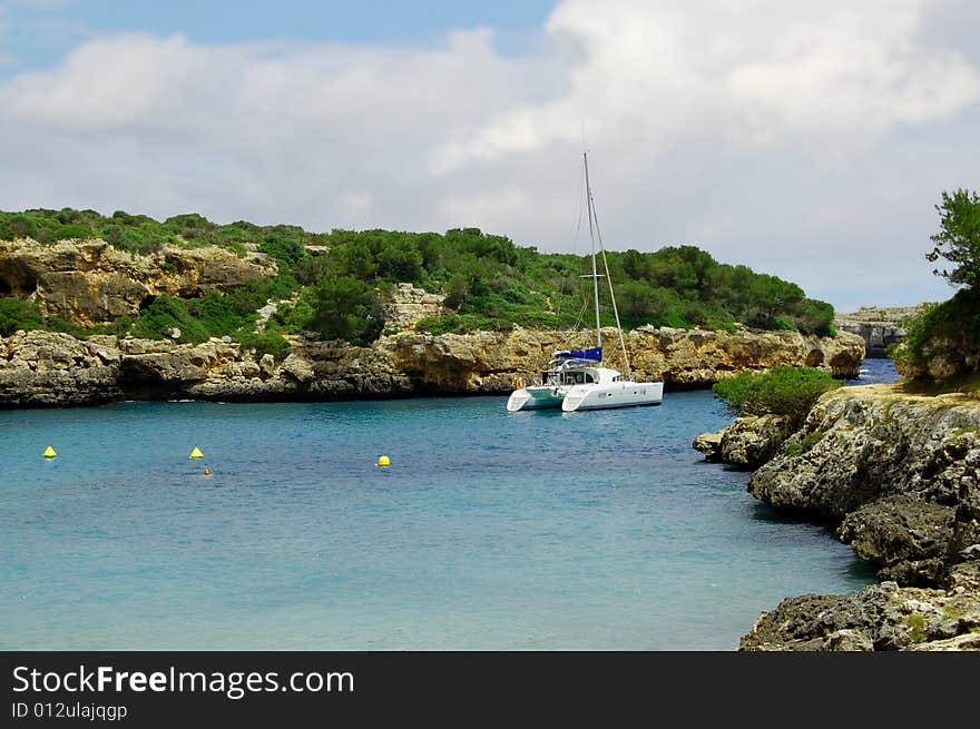 Marine landscape with yacht in coastal waters. Marine landscape with yacht in coastal waters