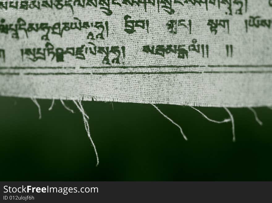 Close up of a Tibetan prayer flag. Close up of a Tibetan prayer flag