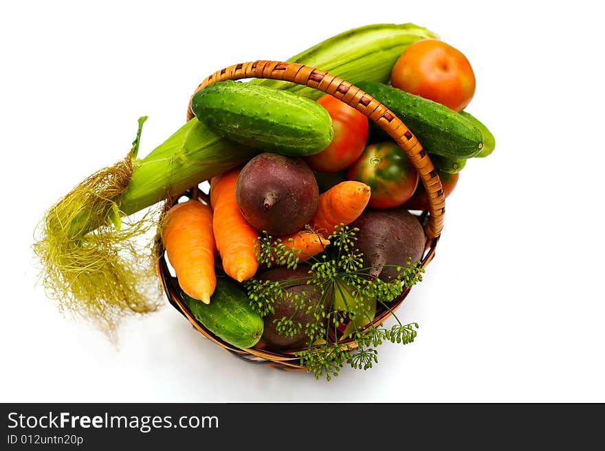 An image of  fresh vegetables in wooden backet. An image of  fresh vegetables in wooden backet