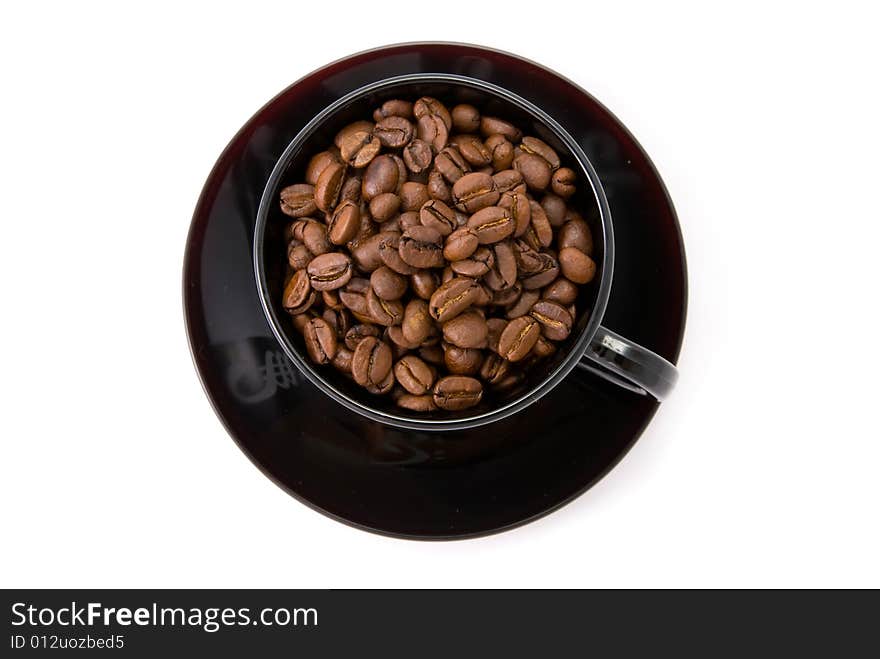 Full Cap of roasted beans coffee isolated on white. Full Cap of roasted beans coffee isolated on white