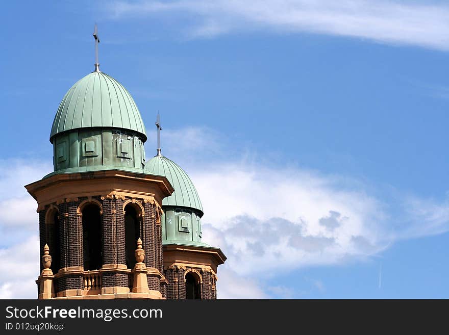 Top of a church with a blue sunny background