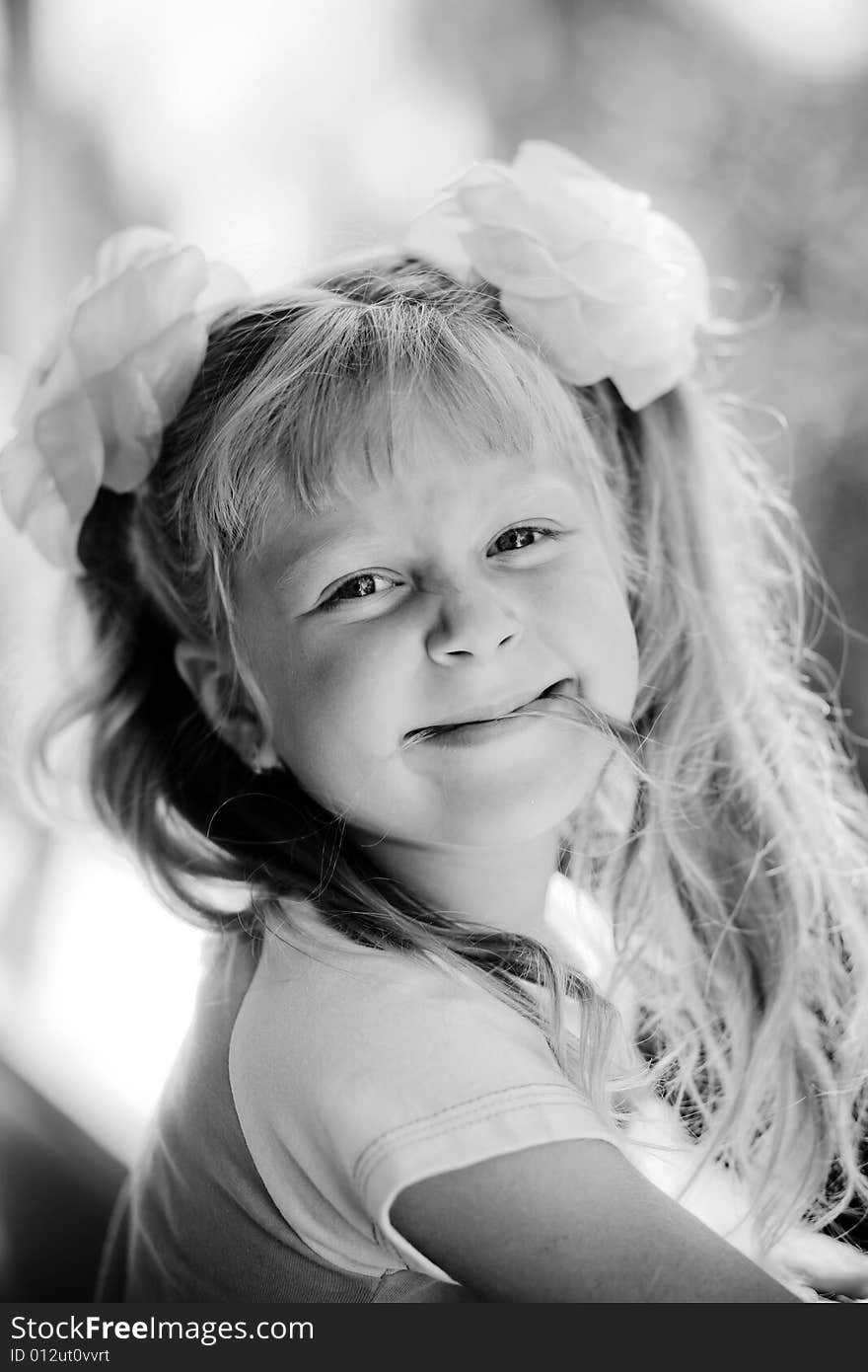 Black and white portrait of nice girl. Outdoor. Black and white portrait of nice girl. Outdoor.