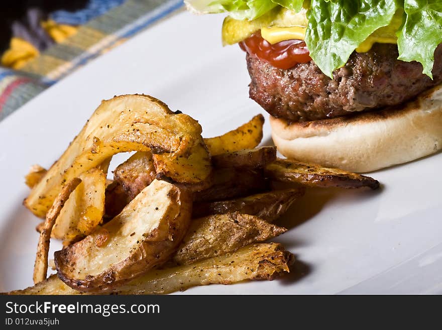 Nice big juicy hamburger on a white plate. Nice big juicy hamburger on a white plate