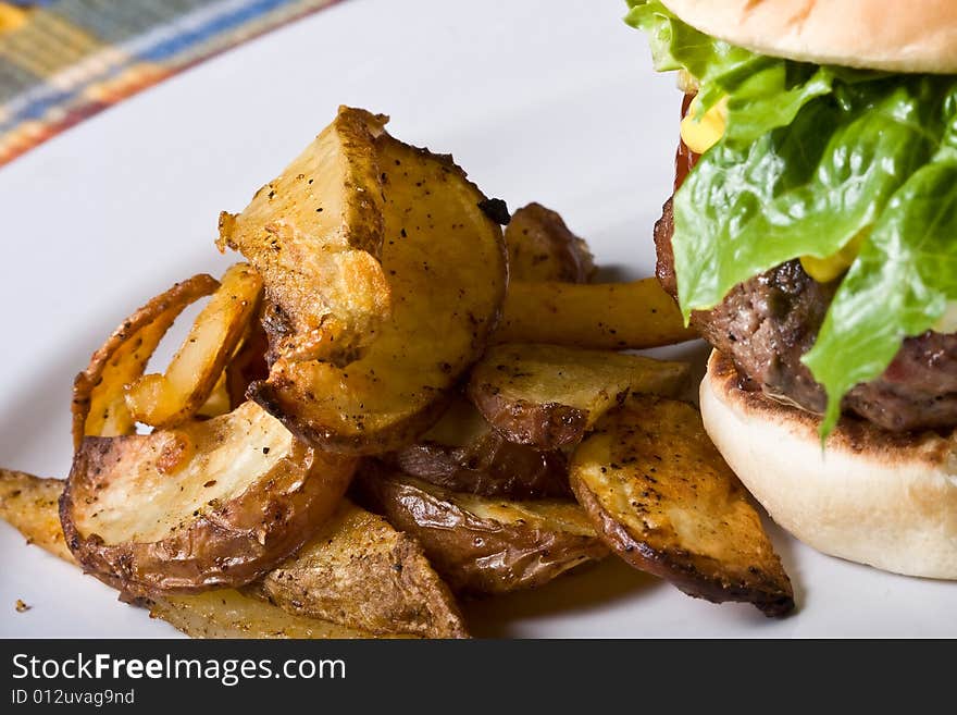 Nice big juicy hamburger on a white plate. Nice big juicy hamburger on a white plate