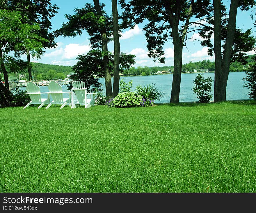 Sunny summer day on beach of a lake. Sunny summer day on beach of a lake