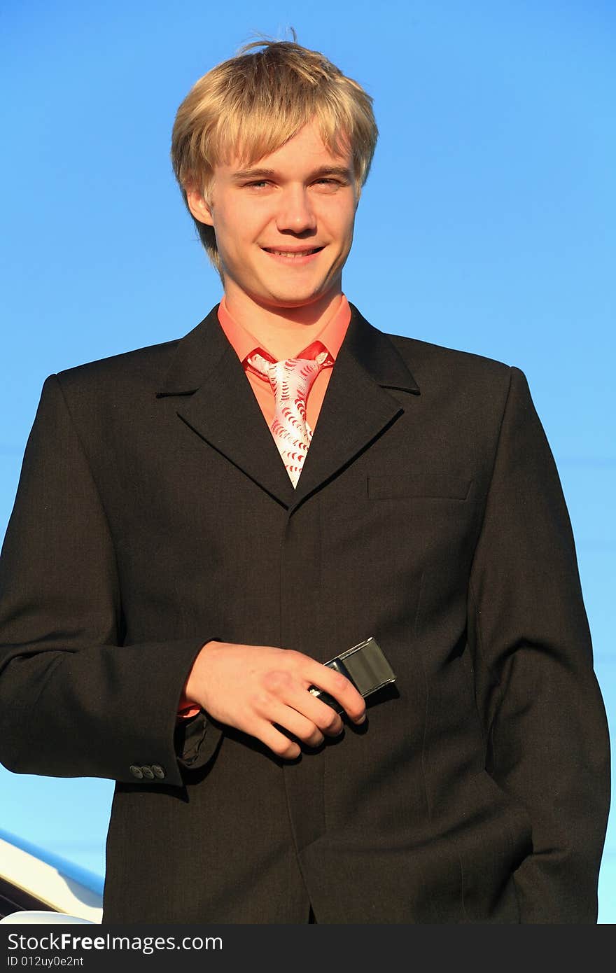 Business background: handsome businessman in a work process.