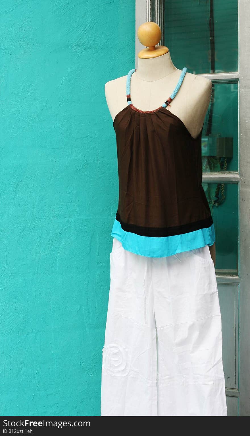 Modern summer clothing on a fashion mannequin.