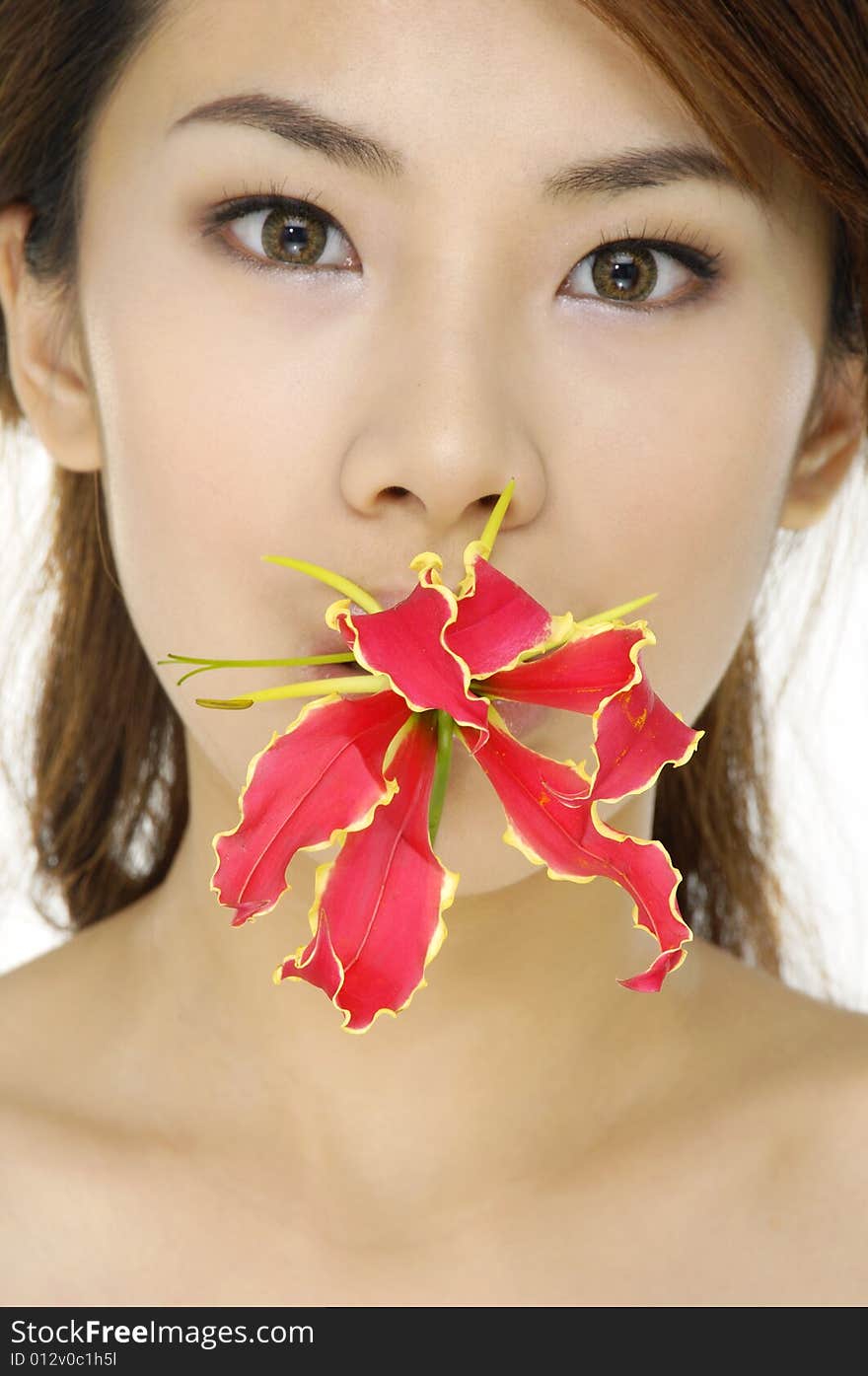 Asia beautiful girl with red flower