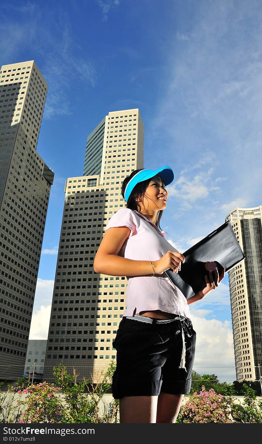 Picture of girl in casual attire. Can signify an intern, a dressed down friday or picture of a friendly face in the serious corporate world. Picture of girl in casual attire. Can signify an intern, a dressed down friday or picture of a friendly face in the serious corporate world.