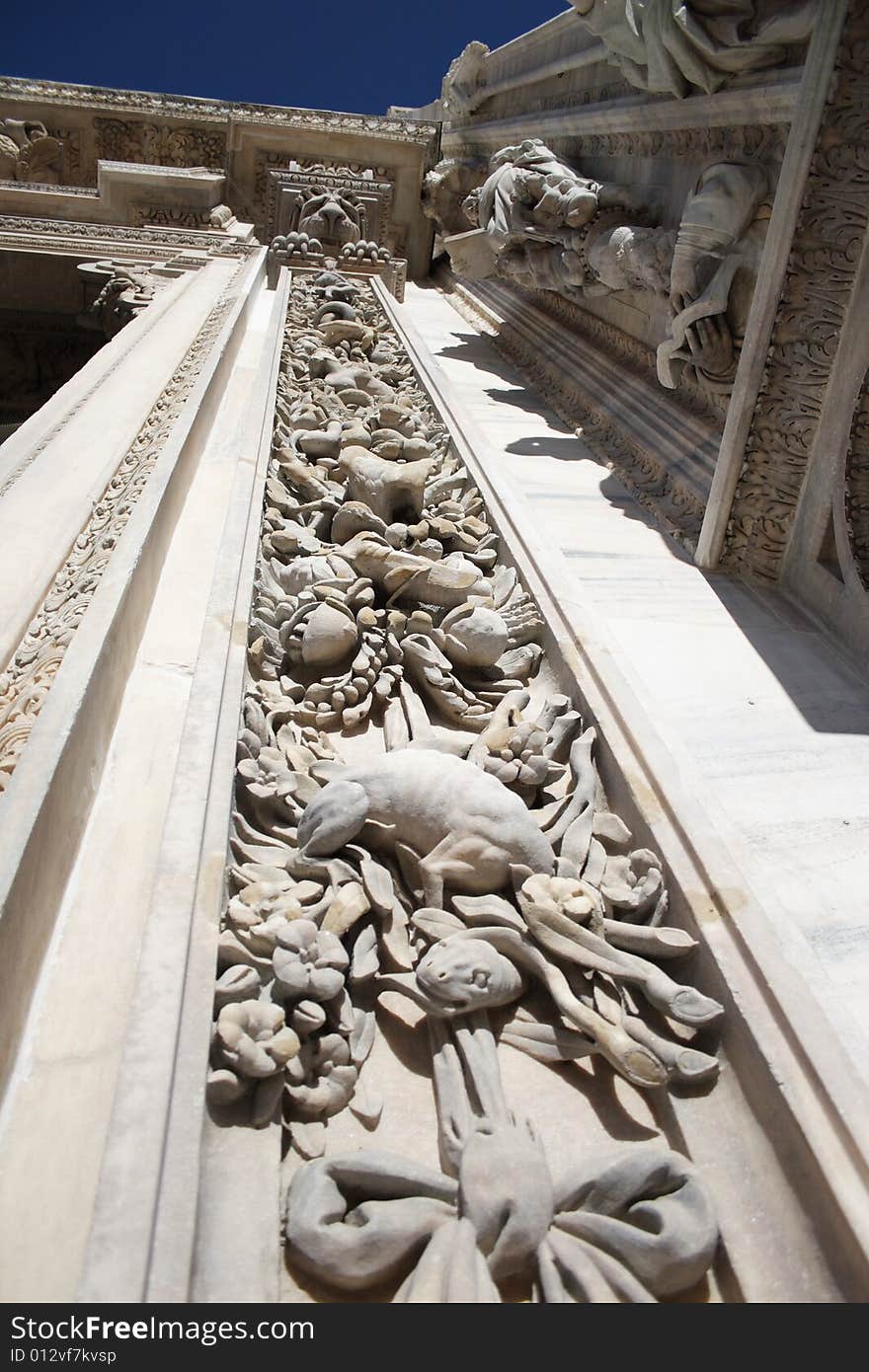 Plaster on the side of the door of the cathedral