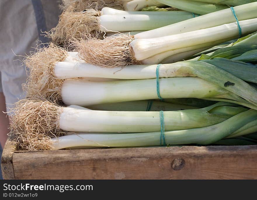 Vegetables stall in street market,leeks close up