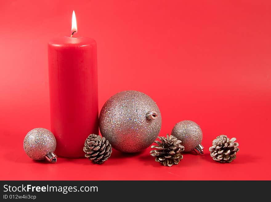 Christmas decoration on a red background (place for the text)