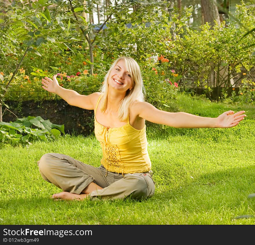 Beautiful young woman relaxing outdoors