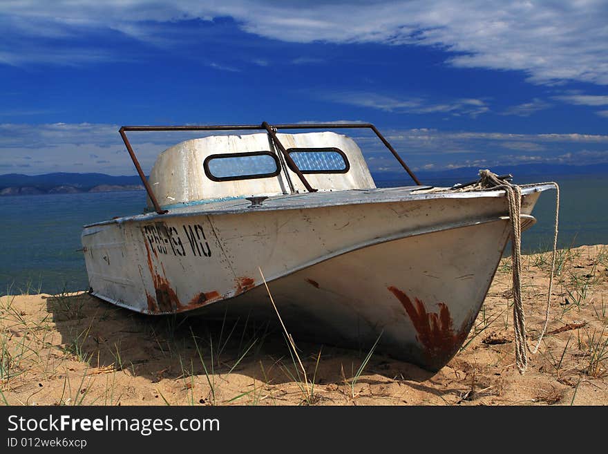 Rusty Broken boat on the beach