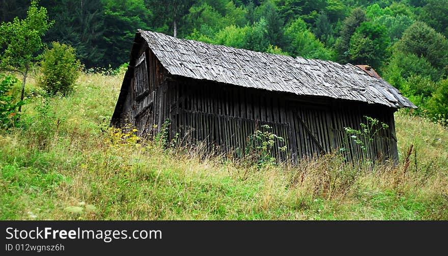 Wooden barn in romanian countryside