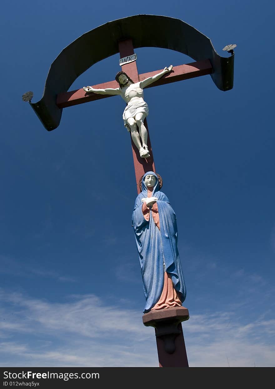 Cross with Jesus Christ and Madonna along a footpath in Bavaria. Cross with Jesus Christ and Madonna along a footpath in Bavaria