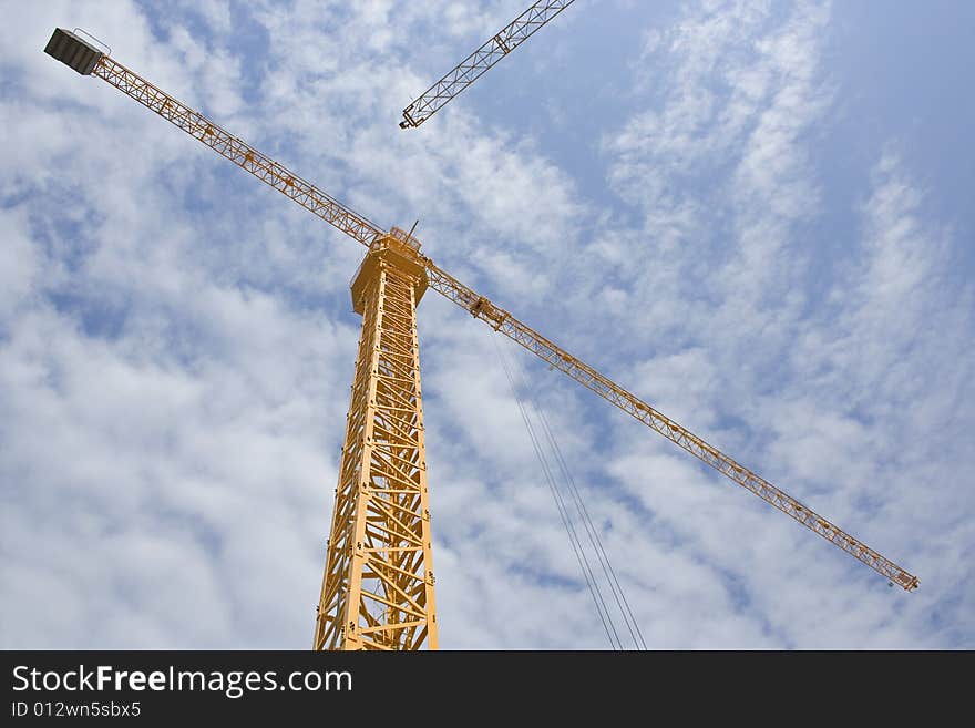 High crane and beautiful sky. Photo taken form under. High crane and beautiful sky. Photo taken form under.