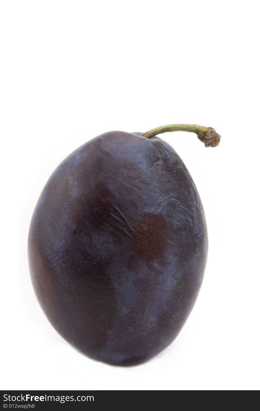 Fresh plums on white background