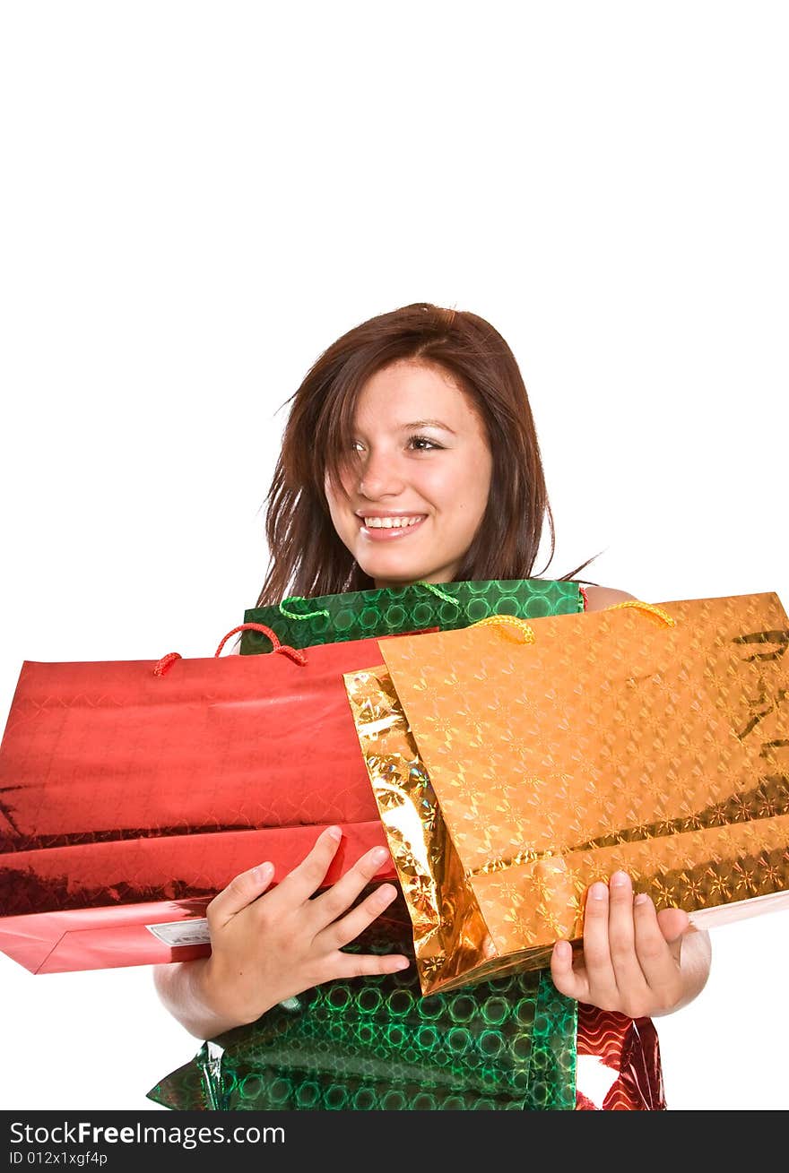 The young girl with packages after shopping.