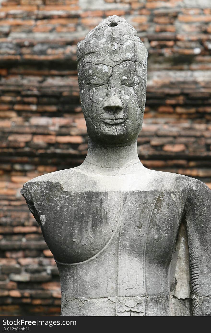 A buddha face in a historical park in inland Thailand. A buddha face in a historical park in inland Thailand