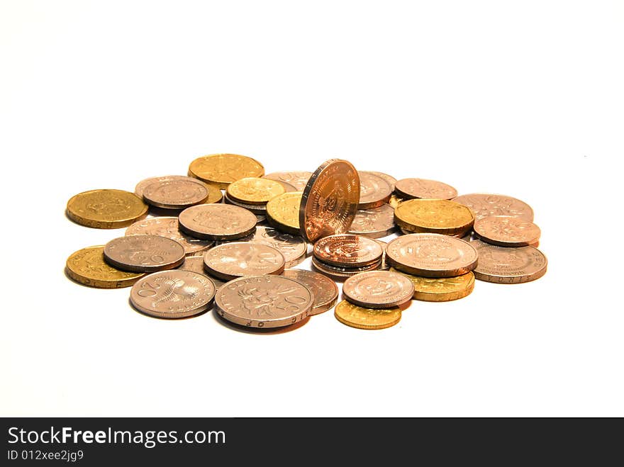 Golden coins isolated on white background