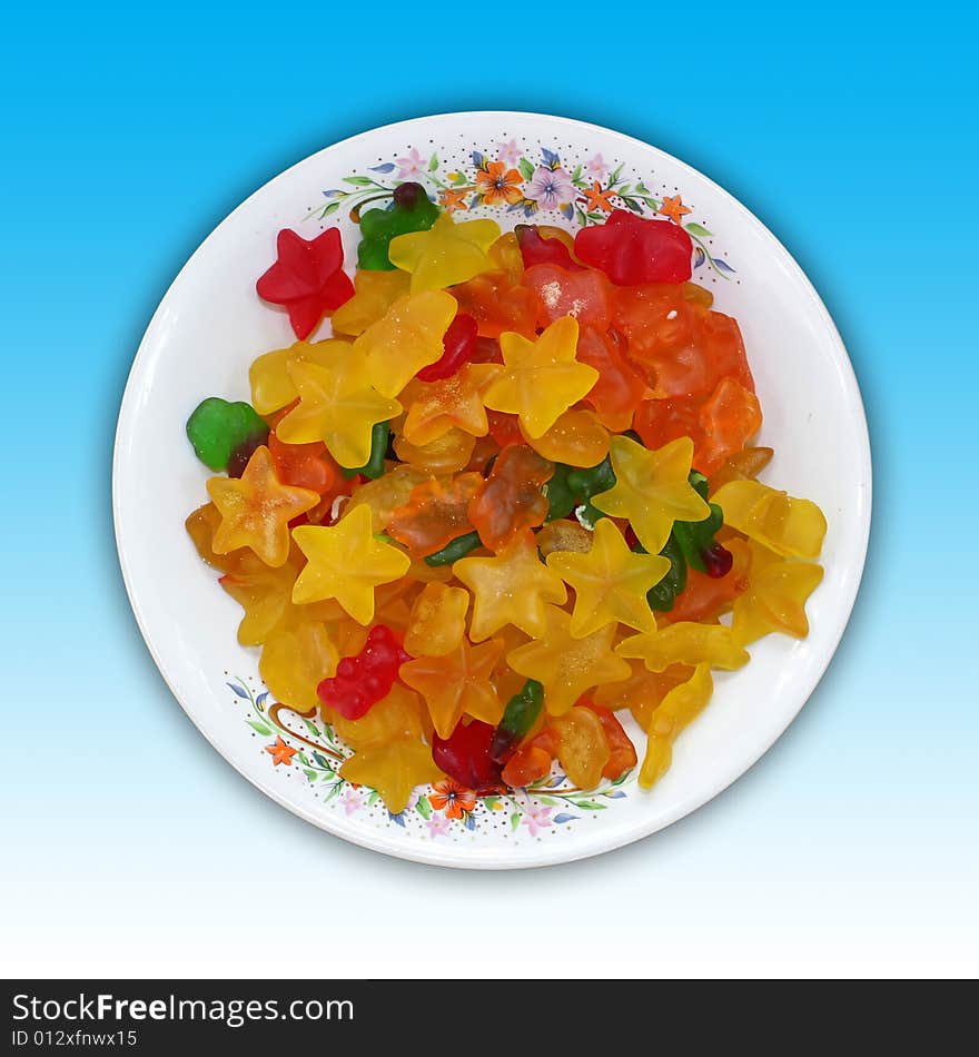 A plate of star and bear shaped jelly candies.
Including clipping path.