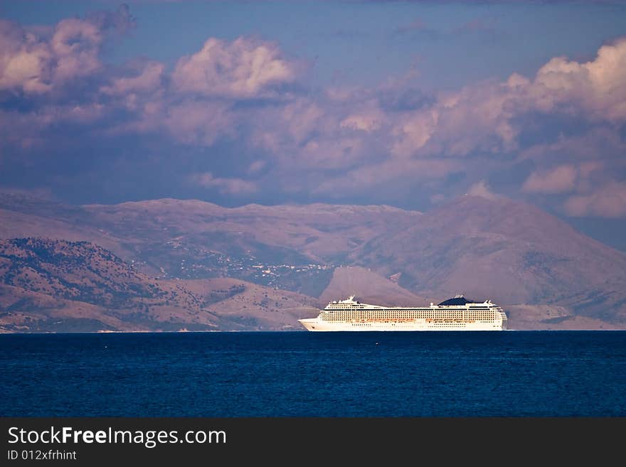 Cruise ship at sunset near Albania