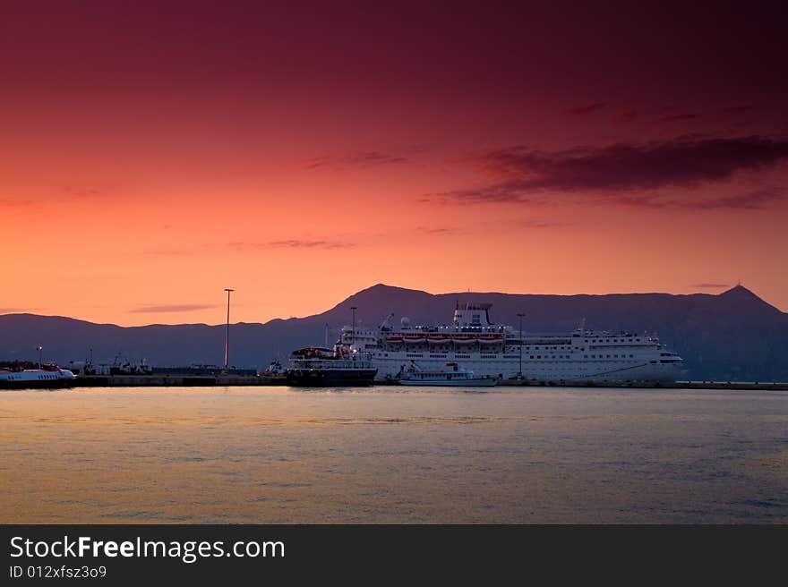 Cruise ship at sunset in greece